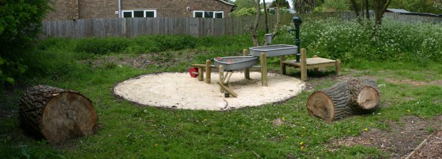 A sand and water play feature aimed at younger children