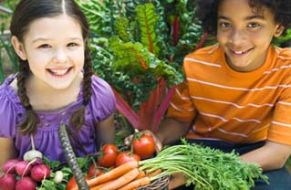 You can grow things that can be harvested before the summer holidays - if you start early enough and with the right varieties