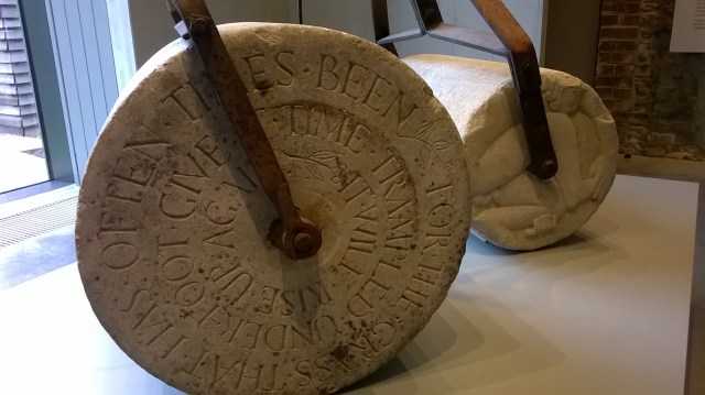 Carved lawn rollers by sculptor Eric Gill, at Ditchling Arts and Crafts Museum, Sussex