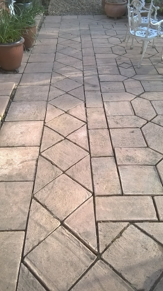 Getting cleaner- the terrace after it's first pressure wash