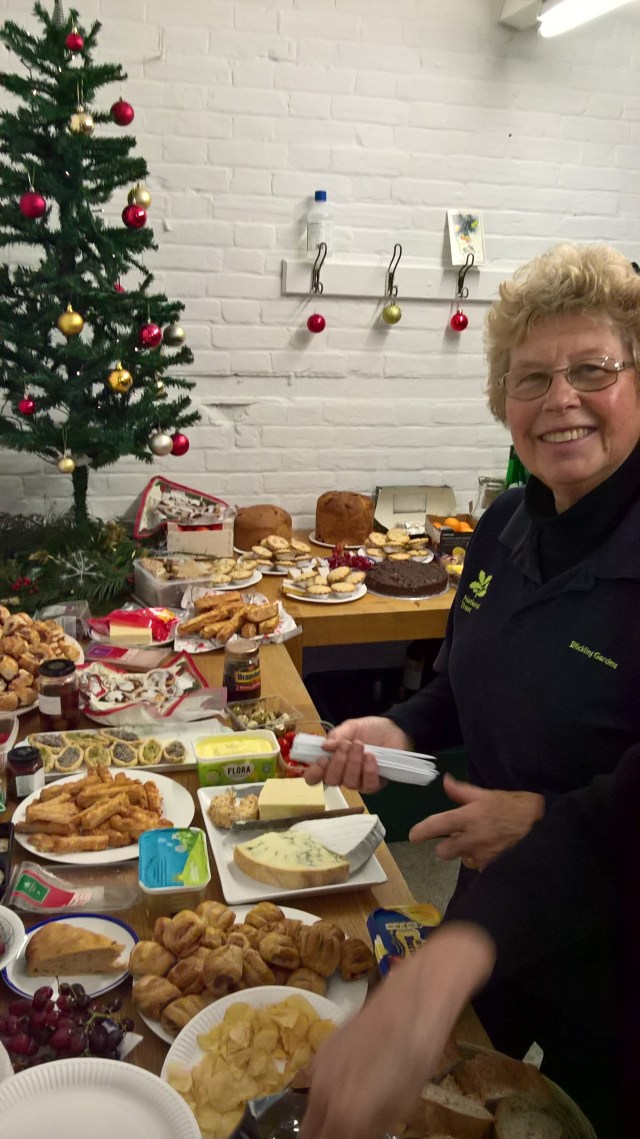 Volunteer Pam setting out the food...